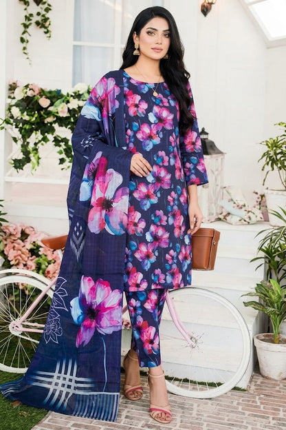 Woman wearing a floral dress standing in a decorated outdoor setting with plants and a bicycle.